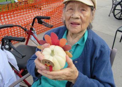 woman-holding-pumpkin